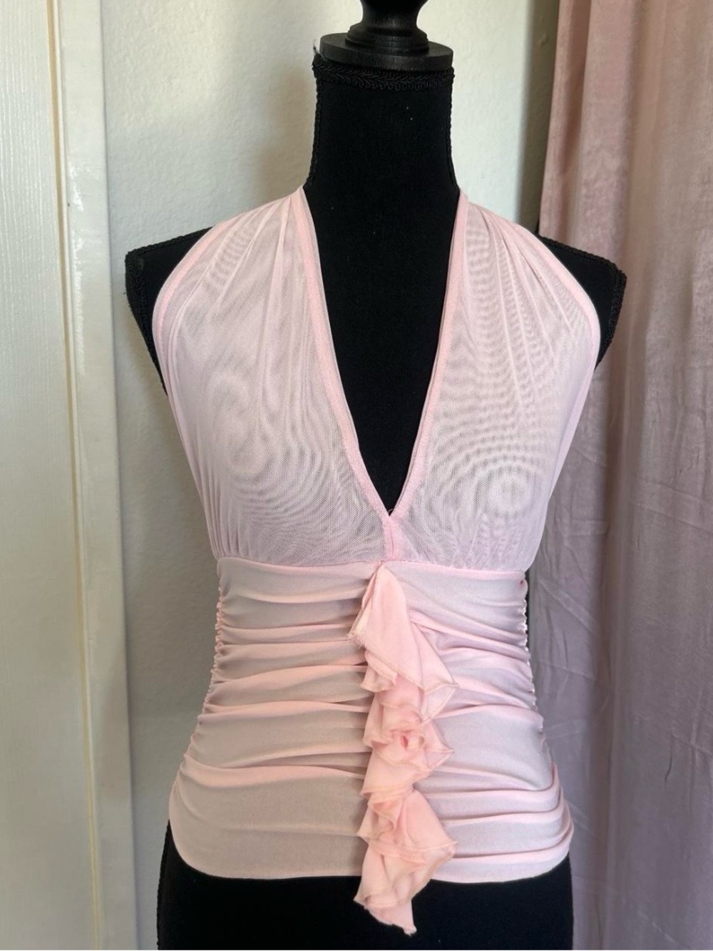 Pink halter neck top with ruffles